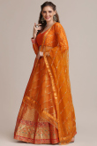 Lehenga for Party Wear in Jacquard Orange with Zari embroidery