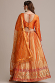 Lehenga for Party Wear in Jacquard Orange with Zari embroidery