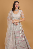 Mirror Embroidered Off-White Net A-line Lehenga for Wedding & Party