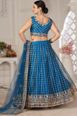 Peacock Blue Net Sequins Embroidered Panelled Style Lehenga 