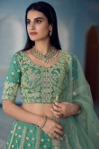 Persian Green Organza Zari Embroidered Panelled Lehenga