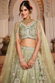 Pistachio Green Tissue Silk Lehenga With Dori Work For Sangeet 