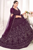 Plum Purple Net Wedding Wear Embroidered Lehenga