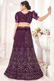 Plum Purple Net Wedding Wear Embroidered Lehenga