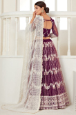 Purple Net Embroidered Wedding Wear Lehenga