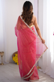 Rani Pink Net Embroidered Saree With Halter Neck Blouse