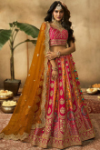 Ruby Pink Embroidered Silk Wedding Wear Lehenga