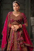 Ruby Pink Velvet Embroidered Wedding Wear Lehenga 