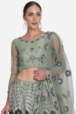 Sage Green A Line Wedding Wear Lehenga in Net
