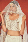 Sequins Embroidered Art Silk Ivory Lehenga