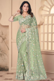 Stone Embellished Pistachio Green Net Light Weight Saree