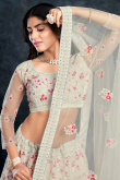 Stone Work Embroidered Net Creamy Pink Lehenga