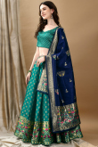 Teal Green Art Silk Woven Zari Panelled Style Lehenga