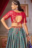 Teal Green Art Silk Zari Weaved Flared Style Lehenga