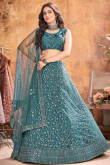 Teal Green Floor Length Party Wear Lehenga in Net