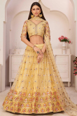Trombone Yellow Net Embroidered Lehenga