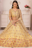 Trombone Yellow Net Embroidered Lehenga