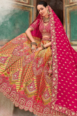 Trombone Yellow Silk Embroidered Panelled Style Lehenga