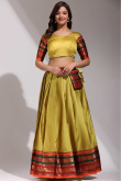 Turmeric Yellow Casual Wear Weaved Zari Silk Lehenga 