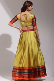 Turmeric Yellow Casual Wear Weaved Zari Silk Lehenga 