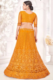 Turmeric Yellow Net Embroidered Party Wear Lehenga