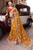 Turmeric Yellow Net Embroidered Saree