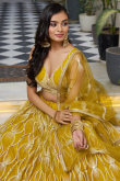 Turmeric Yellow Net Sequins Embroidered Flared Style Lehenga