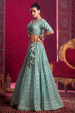 Turquoise Blue Sequins Embroidered Net Bridesmaid
Lehenga 