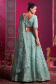 Turquoise Blue Sequins Embroidered Net Bridesmaid
Lehenga 