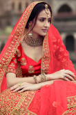 Wedding Wear Paneled Style Embroidered Satin Lehenga In Red