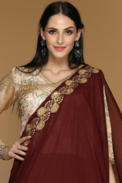 maroon lehenga with golden choli