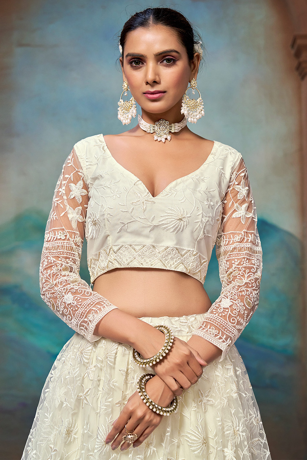 Net Off White Embroidered Festival Wear Lehenga LLCV120749