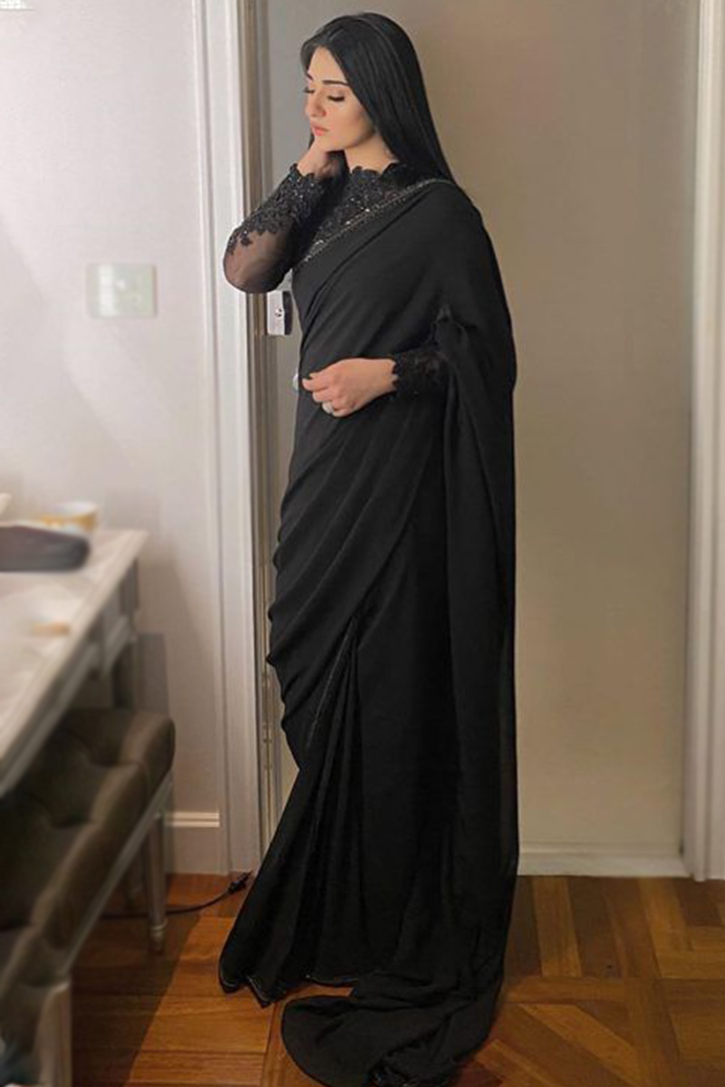 Ananya Nagalla amps up her look in a plain black saree with kalamkari blouse !