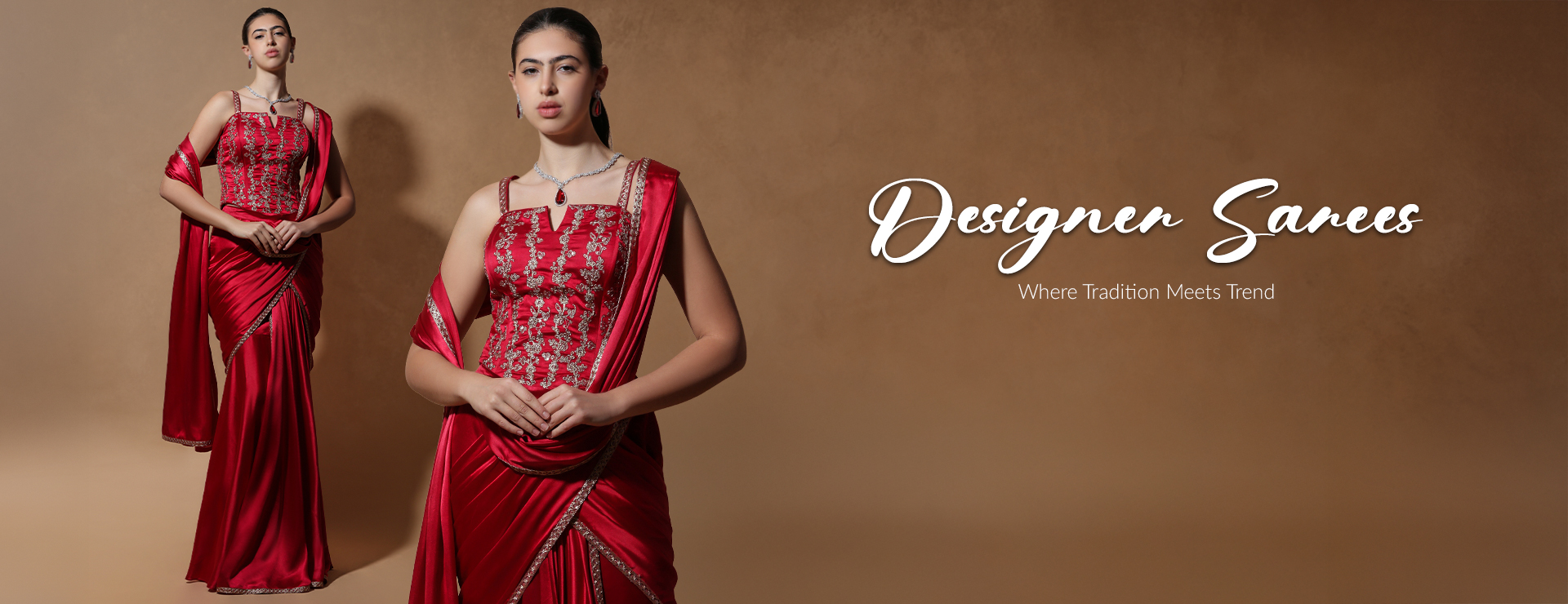 Models wearing a traditional Indian Wear Saree with intricate embroidery, showcasing Andaaz Fashion's Ethnic collection.